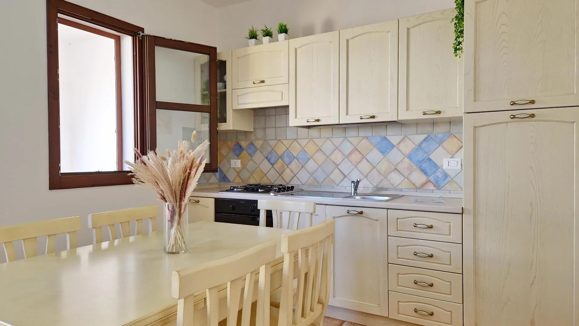 Dommos - Melodie Apartments Cala Liberotto Italy